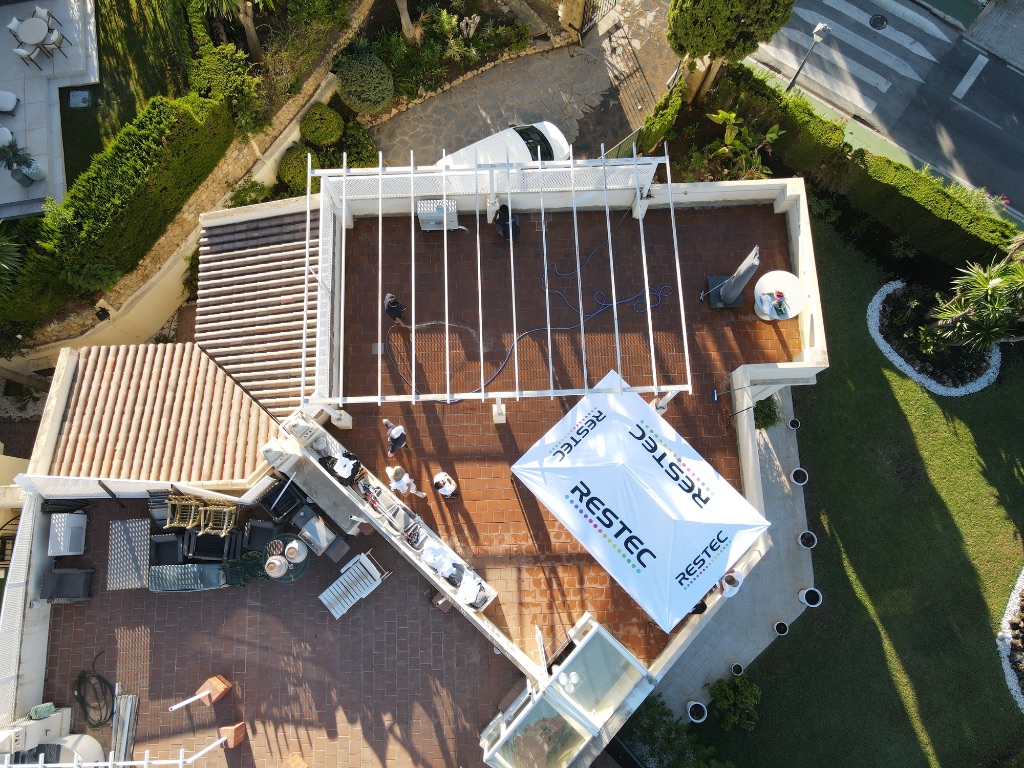 Roof terrace before waterproofing — original terracotta tile surface