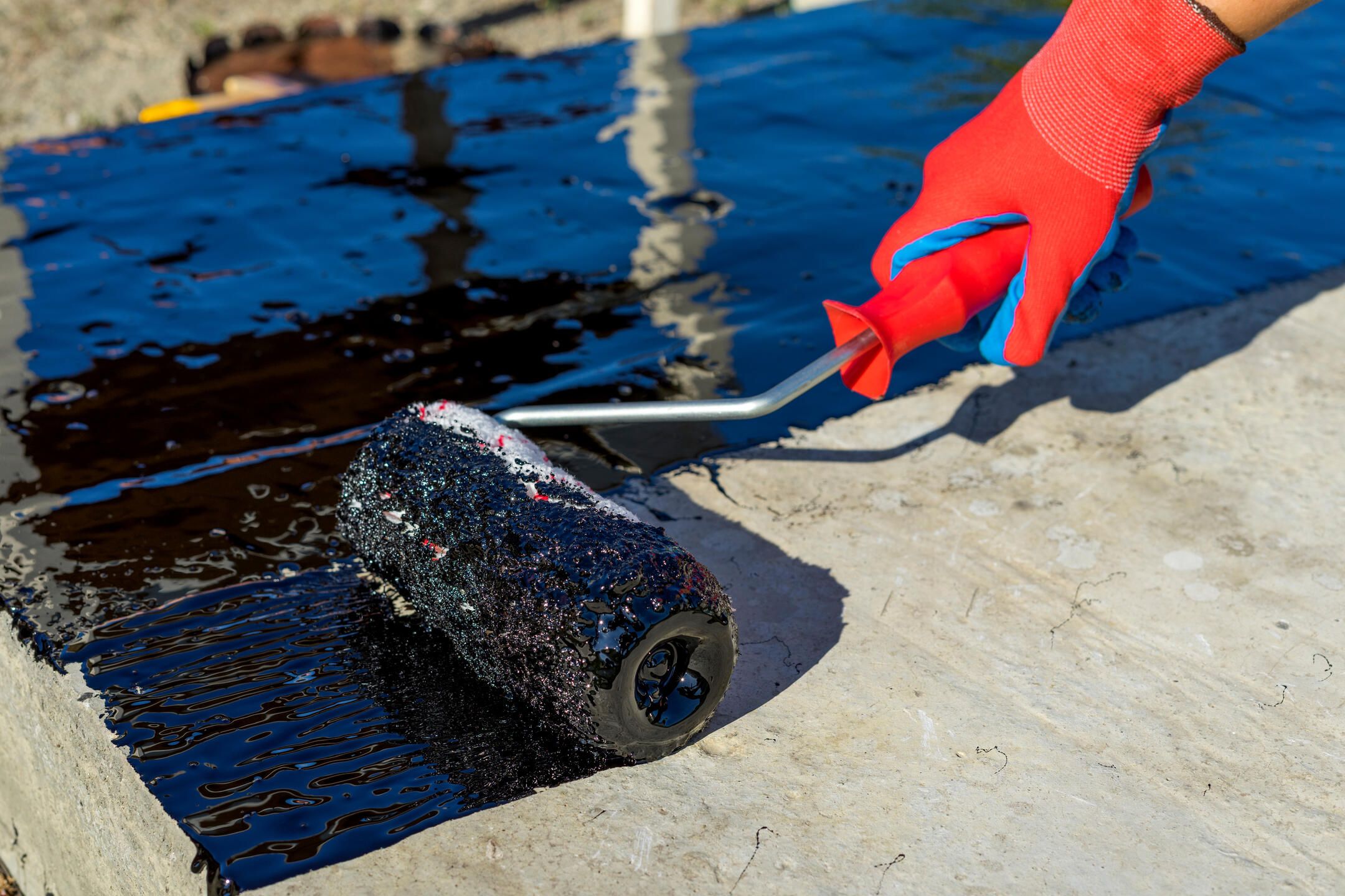 Close-up of waterproofing membrane application